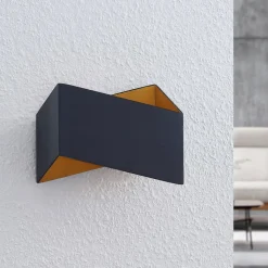 Arcchio Assona wandlamp, zwart-goud
