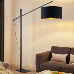 Arcchio gebogen vloerlamp Mossa, 200 cm, zwart-goud, textiel