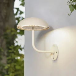 Arcchio LED oplaadbare tafellamp Thenra, beige, muurbeugel