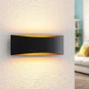 Arcchio LED wandlamp Jelle, 27 cm, zwart/goud, omhoog/omlaag