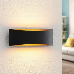 Arcchio LED wandlamp Jelle, 27 cm, zwart/goud, omhoog/omlaag