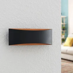 Arcchio LED wandlamp Jelle, 27 cm, zwart/goud, omhoog/omlaag