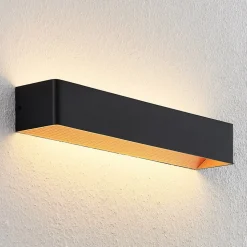 Arcchio LED wandlamp Karam, 53 cm, zwart, metaal, omhoog/omlaag