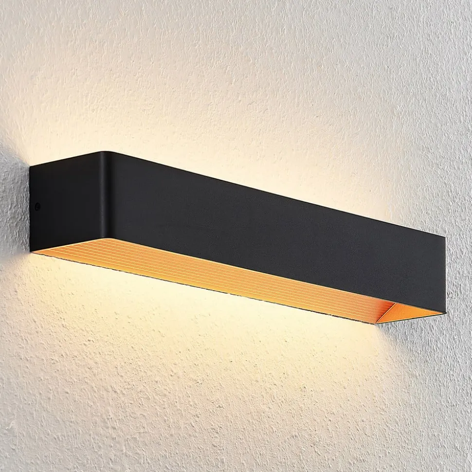 Arcchio LED wandlamp Karam, 53 cm, zwart, metaal, omhoog/omlaag