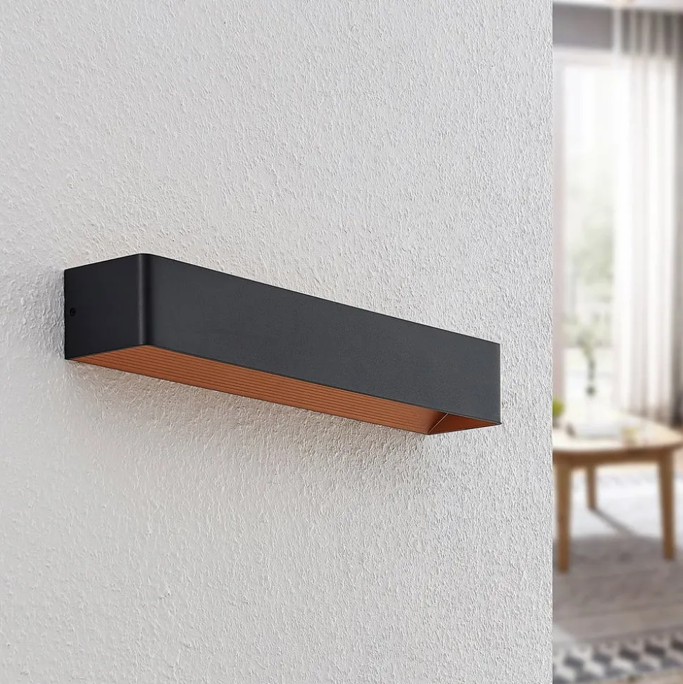 Arcchio LED wandlamp Karam, 53 cm, zwart, metaal, omhoog/omlaag