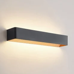 Arcchio LED wandlamp Karam, 53 cm, zwart, metaal, omhoog/omlaag