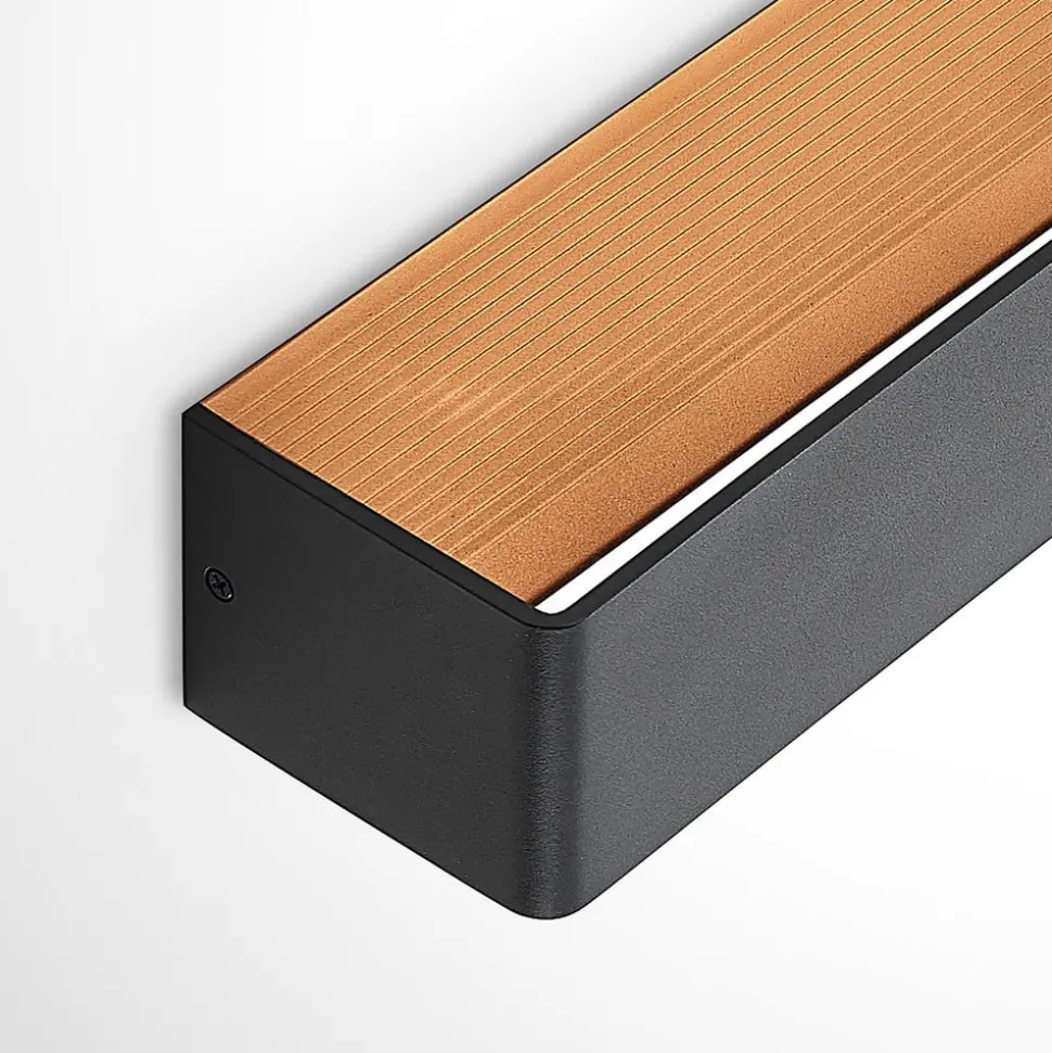 Arcchio LED wandlamp Karam, 53 cm, zwart, metaal, omhoog/omlaag