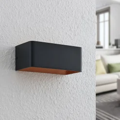 Arcchio LED wandlamp Karam, 20 cm, zwart, metaal, omhoog/omlaag