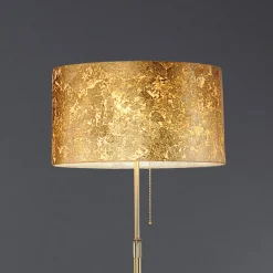 Edele vloerlamp Loop met bladgoud afwerking