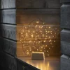LED sfeerlamp 5 kleine ringen, met houten voet
