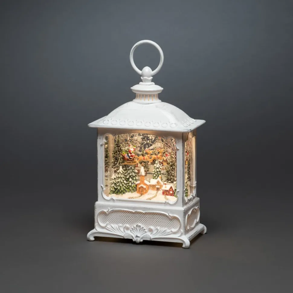 LED waterlantaarn kerstman vliegt over dorp