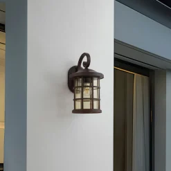 Lindby buitenwandlamp Ankea, roest/amber, 37 cm, IP23, E27