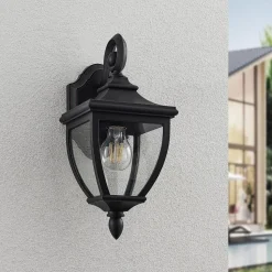 Lindby buitenwandlamp Cerys, zwart, kunststof, hoogte 37cm