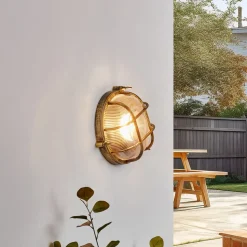 Lindby buitenwandlamp Daaje, goudkleurig, Ø 26 cm, aluminium