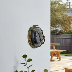 Lindby buitenwandlamp Daaje, goudkleurig, Ø 26 cm, aluminium