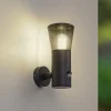 Lindby buitenwandlamp Heulo, Ø 10,5 cm, rookgrijs, sensor