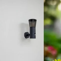 Lindby buitenwandlamp Heulo, Ø 10,5 cm, rookgrijs, sensor