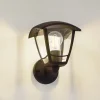 Lindby buitenwandlamp Isidoro, zwart, lantaarn, kunststof