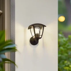 Lindby buitenwandlamp Isidoro, zwart, lantaarn, kunststof