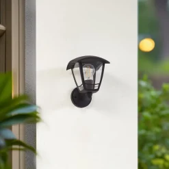 Lindby buitenwandlamp Isidoro, zwart, lantaarn, kunststof