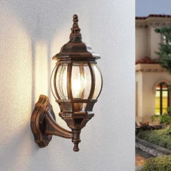 Lindby buitenwandlamp Nadesha, hoogte 47 cm, geborsteld goud