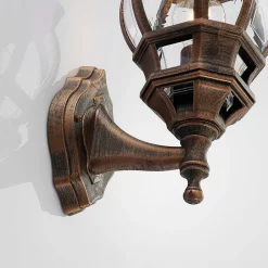 Lindby buitenwandlamp Nadesha, hoogte 47 cm, geborsteld goud