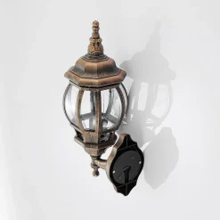 Lindby buitenwandlamp Nadesha, hoogte 47 cm, geborsteld goud