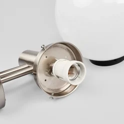 Lindby buitenwandlamp Nada, roestvrij staal, glas, sensor, E27