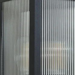 Lindby buitenwandlamp Peldar, 26 cm, geribbeld, IP44, E27