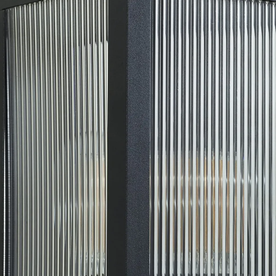 Lindby buitenwandlamp Peldar, 26 cm, geribbeld, IP44, E27