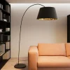 Lindby Esti vloerlamp, zwart/goud, stof, hoogte 192cm