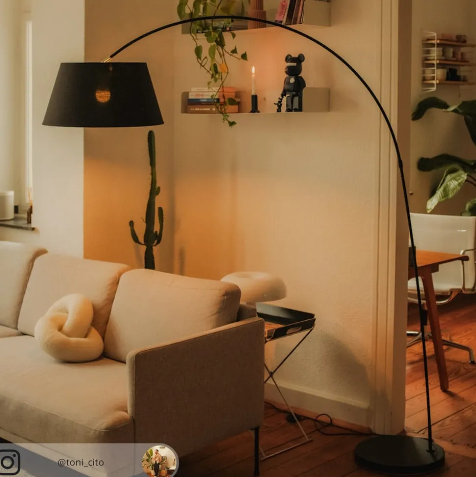 Lindby Esti vloerlamp, zwart/goud, stof, hoogte 192cm
