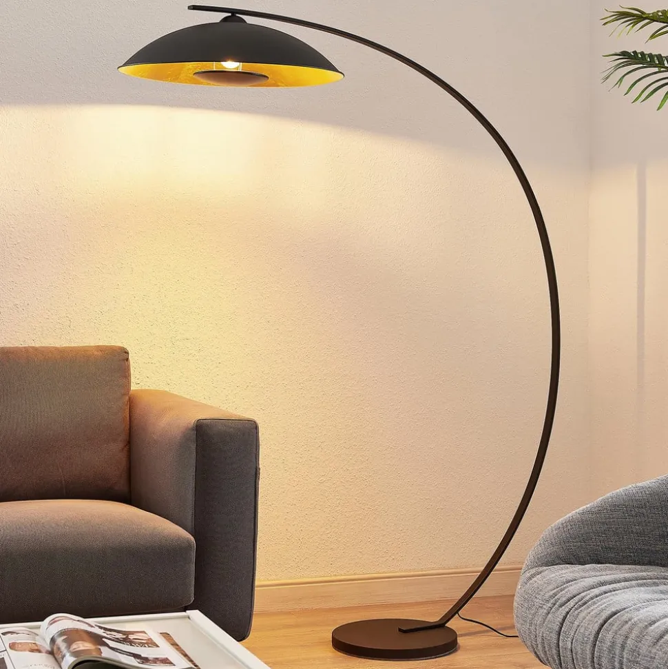 Lindby gebogen vloerlamp Emilienne, zwart, goudkleurig, 180 cm