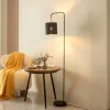 Lindby Hinay textiel-vloerlamp zwart/goud