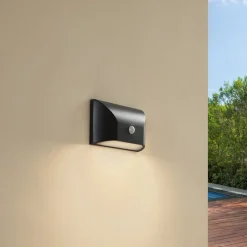 Lindby LED buiten wandlamp Siana, zwart, PC, sensor