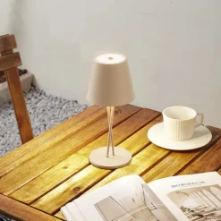 Lindby LED oplaadbare tafellamp Janea, CROSS, beige, metaal