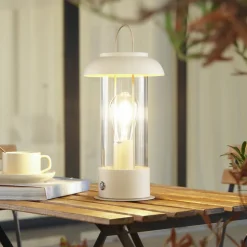 Lindby LED oplaadbare tafellamp Yvette, abrikoos-beige, IP44, touch