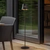 Lindby LED vloerlamp Hilario, zwart, ijzer, oplaadbare batterij