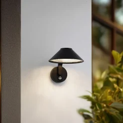 Lindby LED wandlamp Capelo, zwart, aluminium, sensor, Ø20cm