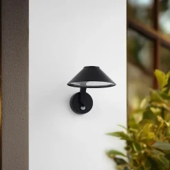 Lindby LED wandlamp Capelo, zwart, aluminium, sensor, Ø20cm