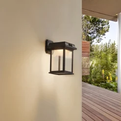 Lindby LED wandlamp Latarka, hoogte 27,5 cm, sensor