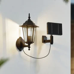 Lindby LED wandlamp op zonne-energie Sayata, zwart, aluminium, lantaarn