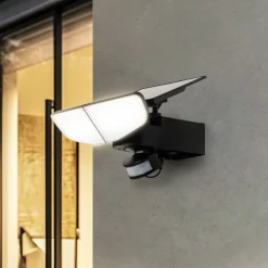 Lindby LED wandlamp op zonne-energie Naelin, zwart, sensor, IP44