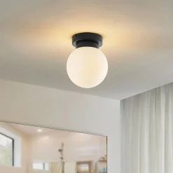 Lindby Tavino plafondlamp, bolvormige kap, zwart