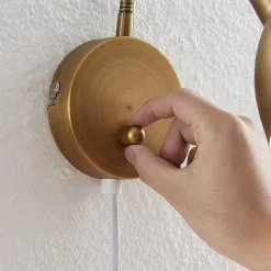 Lindby wandlamp Amrei, brons antiek, 42 cm, stekker, dimbaar