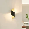 Lindby wandlamp Desirio, zwart/goud, 24cm, metaal