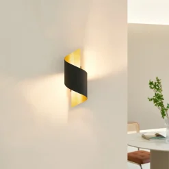 Lindby wandlamp Desirio, zwart/goud, 24cm, metaal