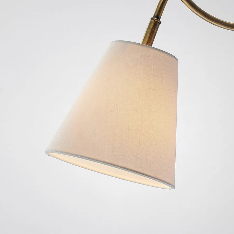 Lindby wandlamp Ethan, wit/oud messing, stekker, 28 cm, E14