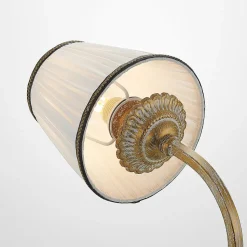 Lindby wandlamp Lumiel, crème/messing, textiel, 27cm