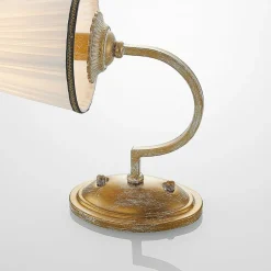 Lindby wandlamp Lumiel, crème/messing, textiel, 27cm